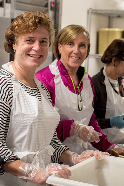 Volunteers preparing meals